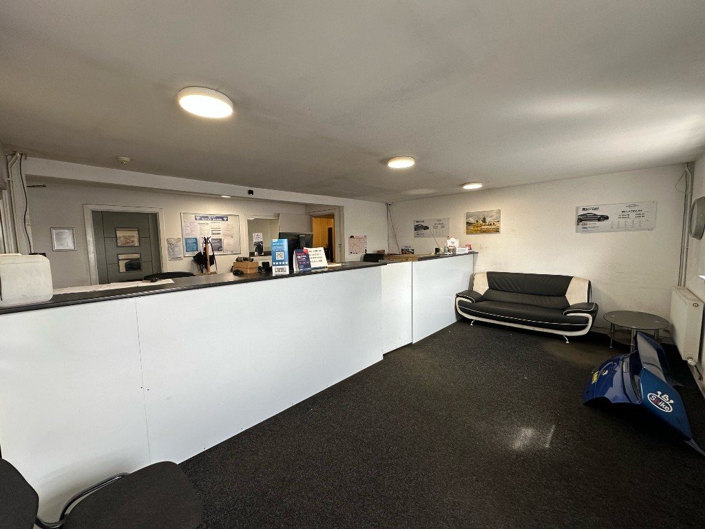 Reception desk and waiting sofa at Bankside MOT & Repair